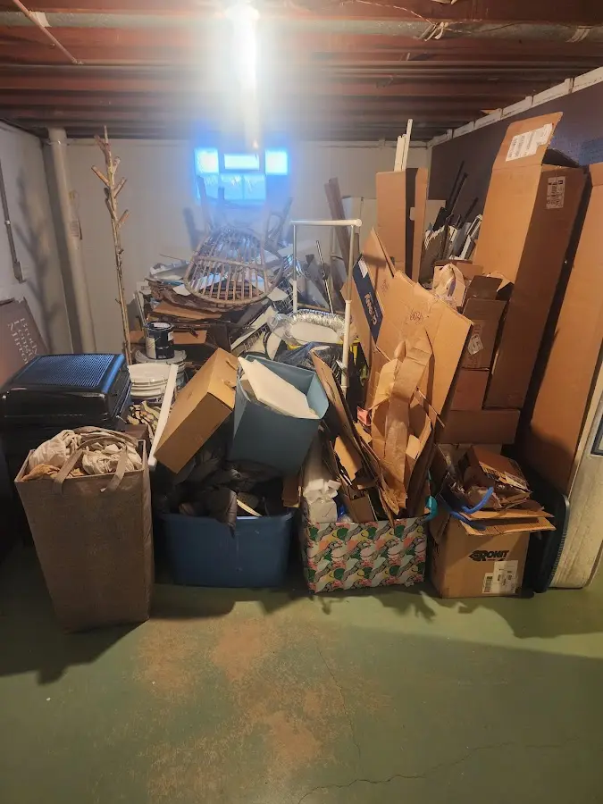 Roll-off dumpster container at job site for Yard Waste Dumpster Rental in The Hammocks